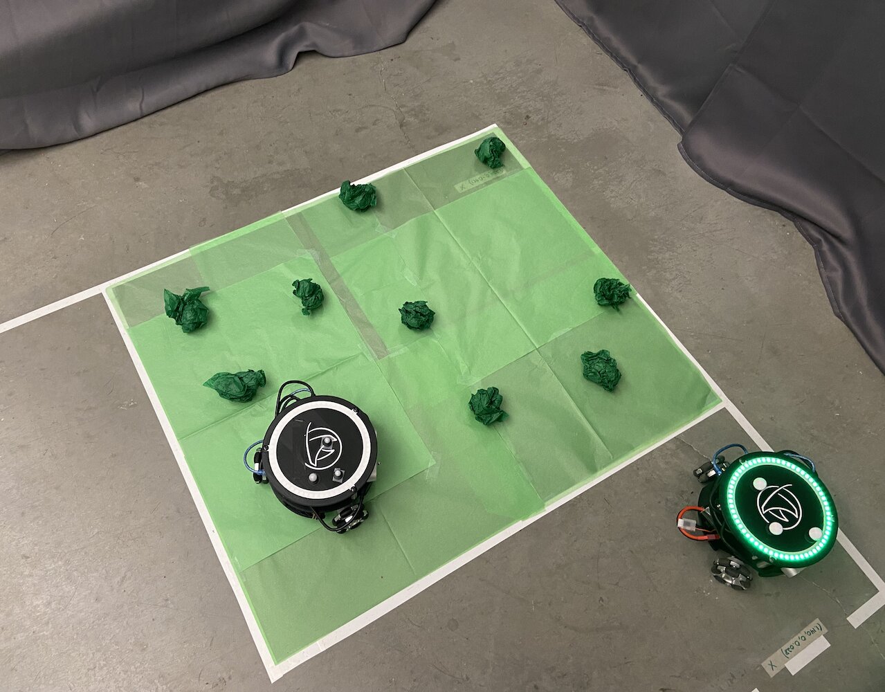 Robots on green grid