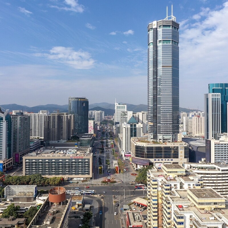 Huaqiangbei at the Shennan Road crossing in Shenzhen, dense with electronics retail towers